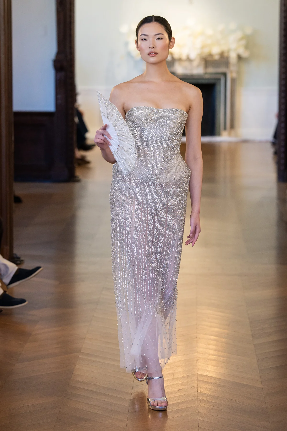 2704 - LEE PETRA GREBENAU - A fully beaded, delicate overlay dress with a gentle Basque waistline and an accentuated silhouette.