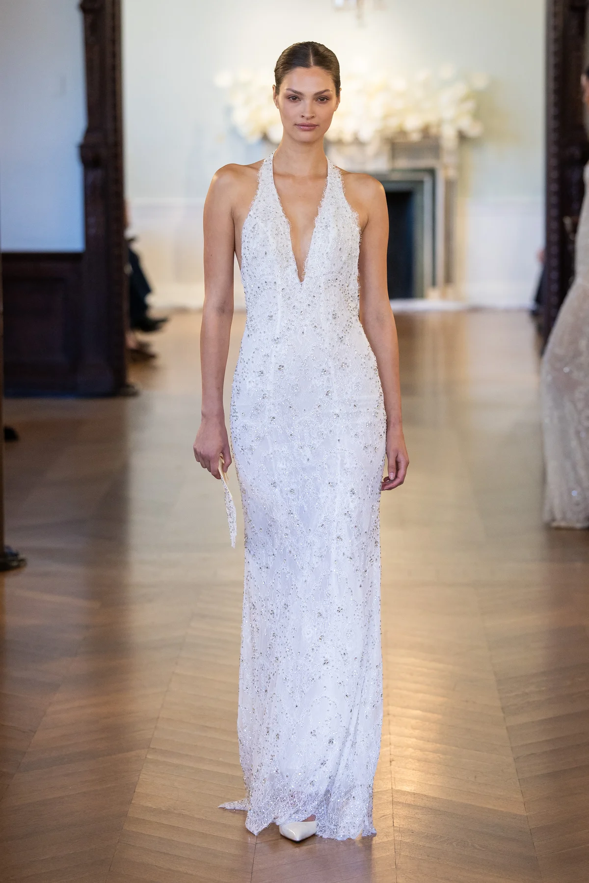2705 - LEE PETRA GREBENAU - A meticulously hand-made, deep V-neck gown entirely fashioned from beaded embroideries.