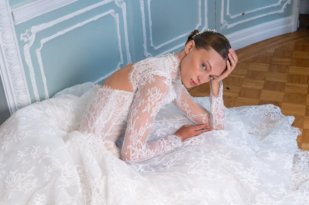Lee Petra Grebenau bride in a long-sleeve lace gown from the Salon Privé Spring/Summer 2027 collection