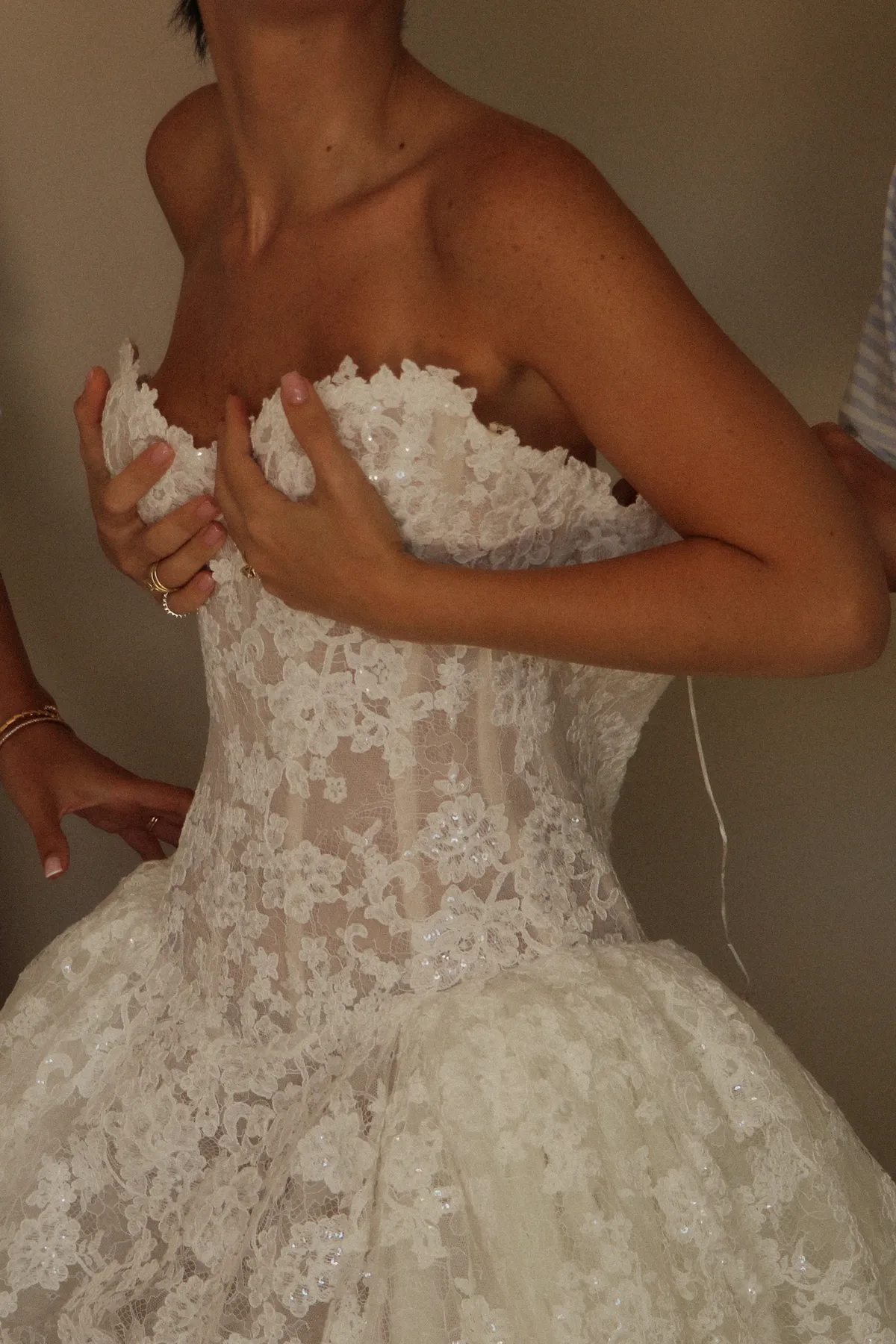 Lace bodice detail of the Lee Petra Grebenau gown — embroidered strapless neckline