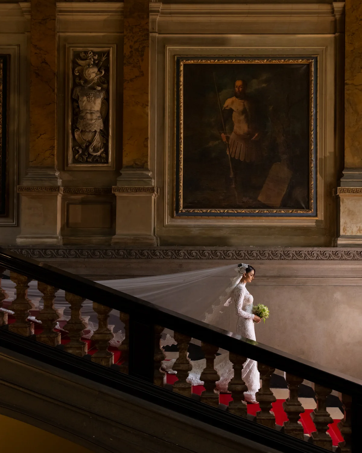 Bride descending the grand staircase at Villa Erba — Lee Petra Grebenau Versailles lace gown
