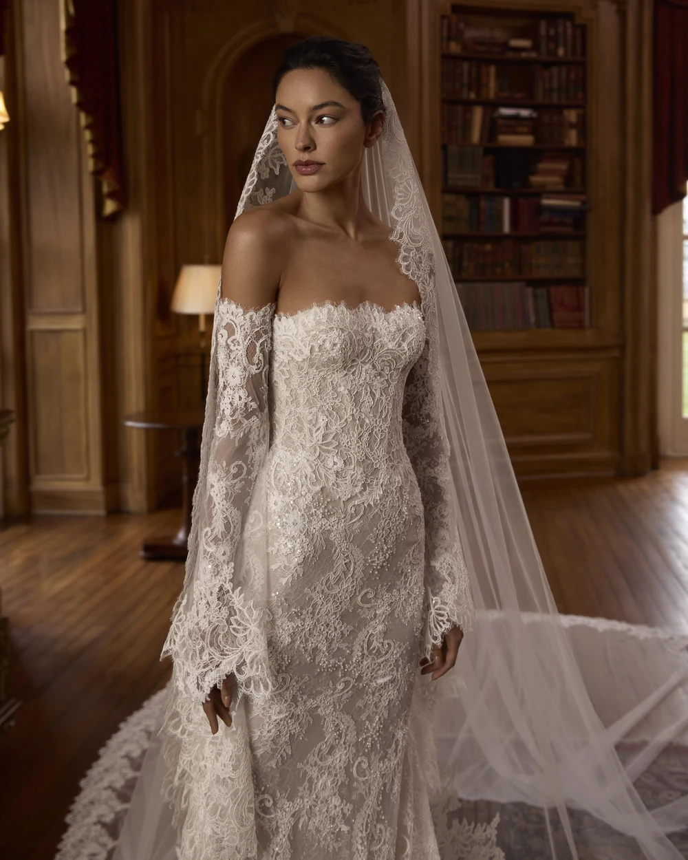 Lee Petra Grebenau Mist gown — fitted lace silhouette with long sleeves and a cathedral veil
